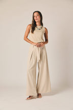 Pantalon large à rayures beige avec lien