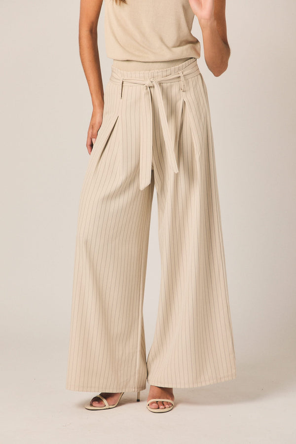 Pantalon large à rayures beige avec lien