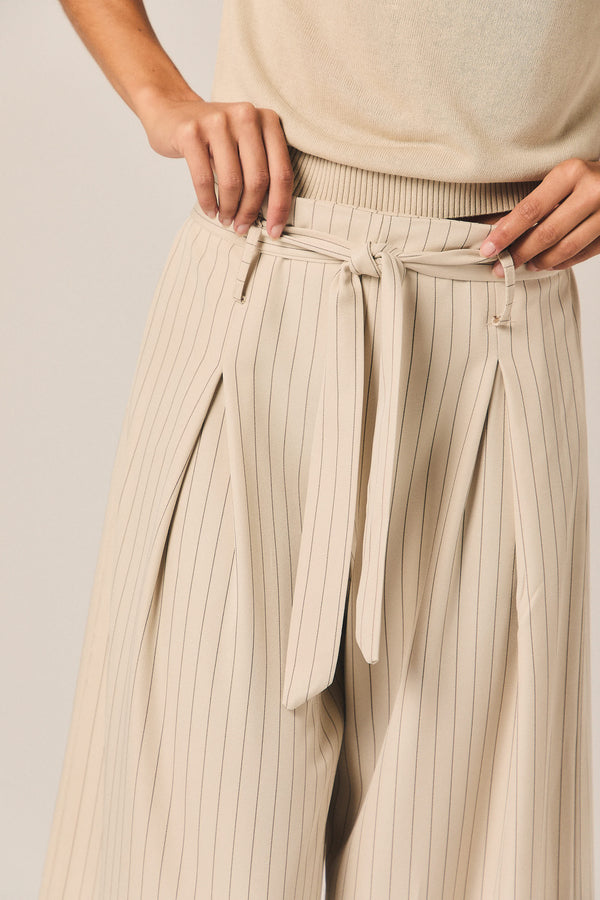 Pantalon large à rayures beige avec lien