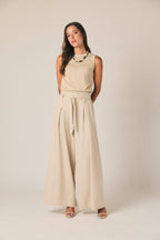 Pantalon large à rayures beige avec lien