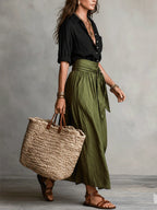 Ensemble deux pièces : top noir et jupe midi vert olive